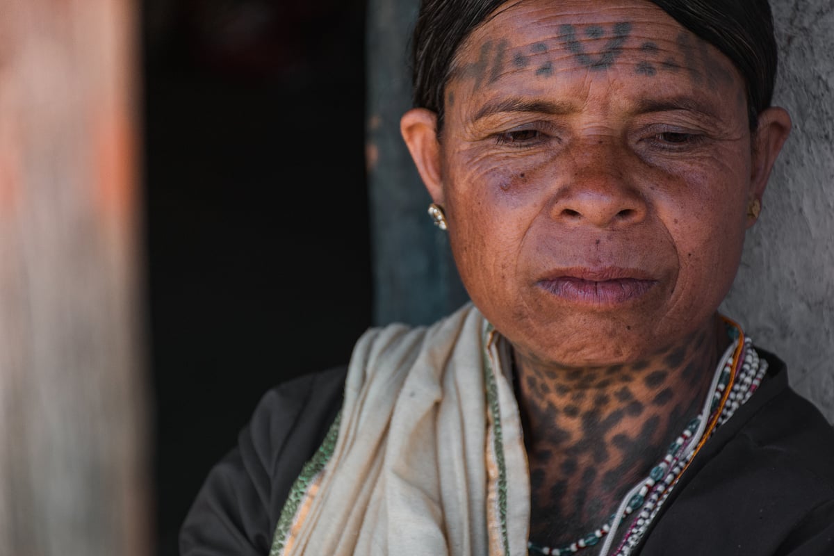 The tattoo on the forehead  is symbolic of the tribe they belong to 