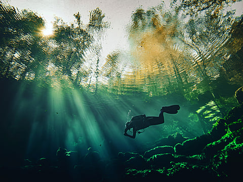 Scuba divers can play a crucial role in cleaning oceans of plastic debris