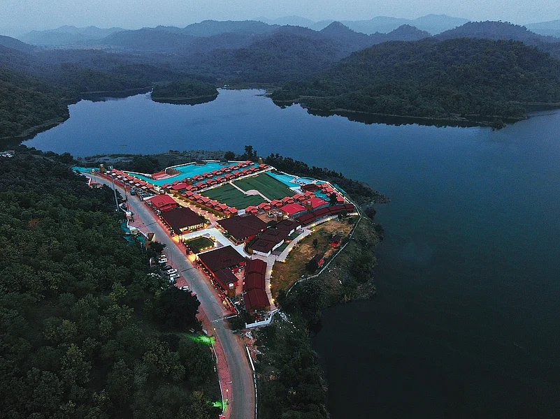 Experience the breathtaking aerial view of Statue of Unity Tent City 1 illuminated at night.