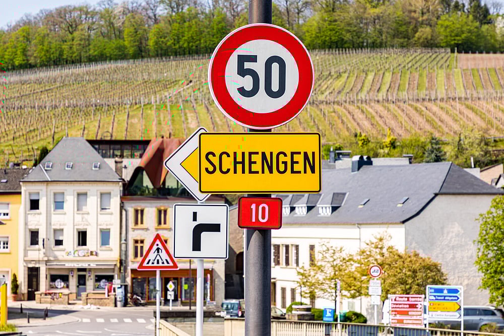 Road sign for Schengen town on the western bank of the river Moselle, Luxembourg, the birthplace of the Schengen Agreement 