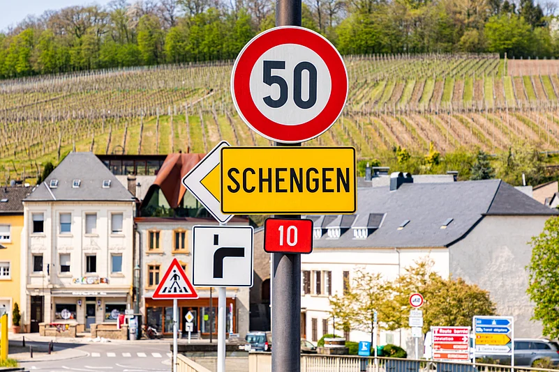 Road sign for Schengen town on the western bank of the river Moselle, Luxembourg, the birthplace of the Schengen Agreement