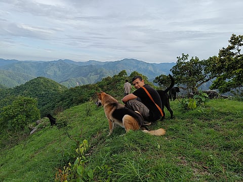 Host Sunando Sen with his dogs