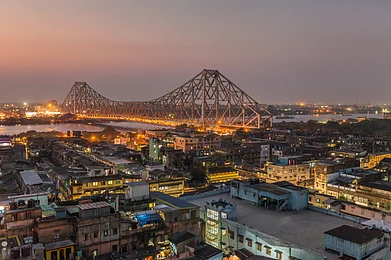 Mazur Travel/Shutterstock : The iconic Howrah Bridge on the river Hooghly