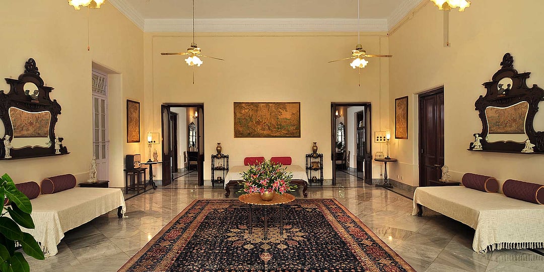 Every room features vintage furniture with intricate wood carvings