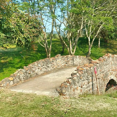 The 18-hole golf course has ponds and bridges