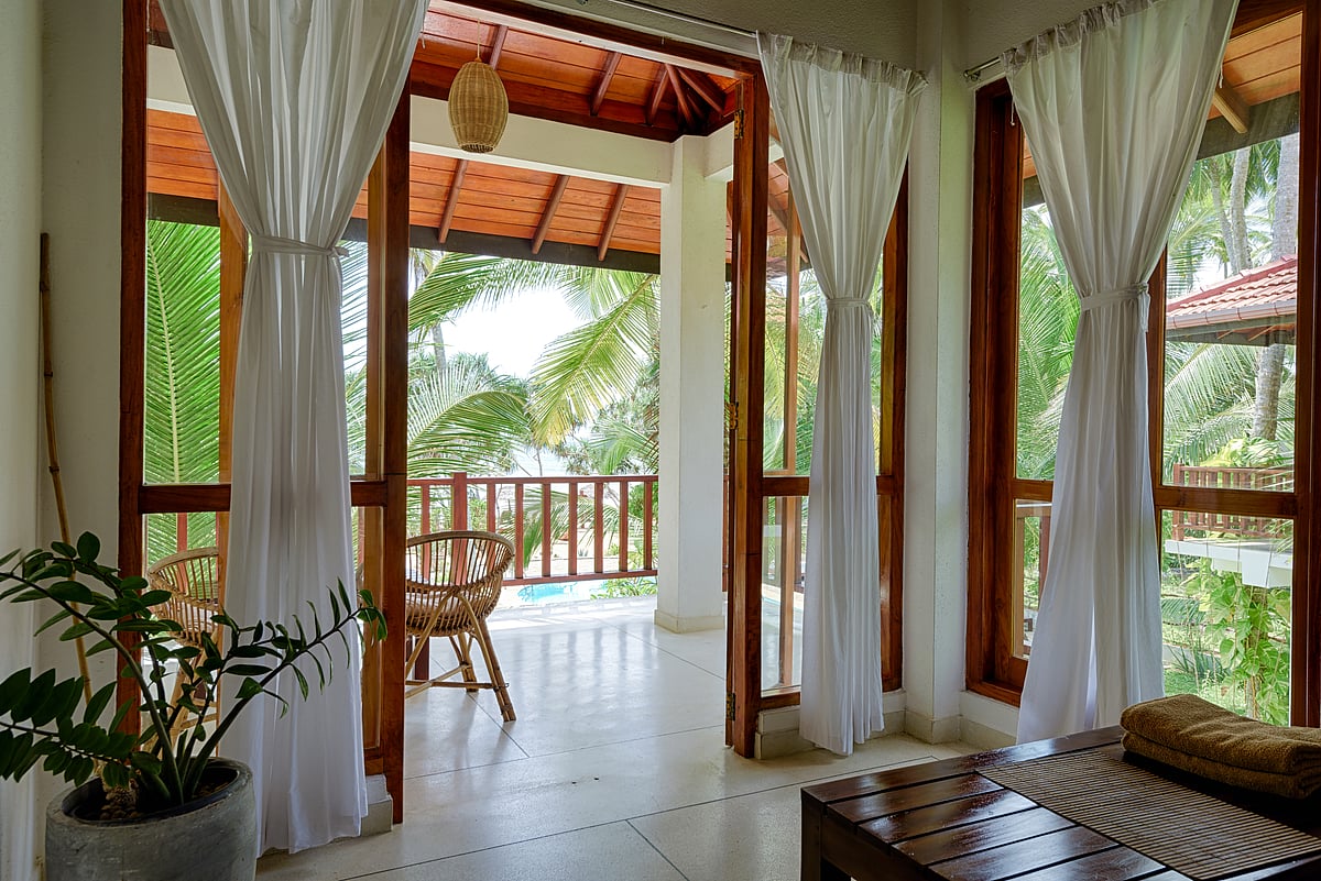 Increase natural light sources and add indoor plants to make your home more in tune with the living world