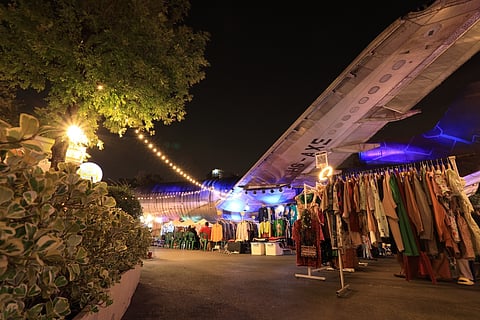 Hang out under an old aircraft at the Chang Chui market