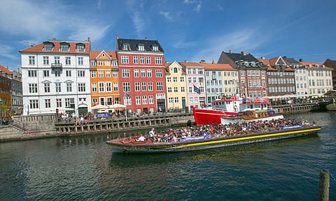 People on a Copenhagen canal tour