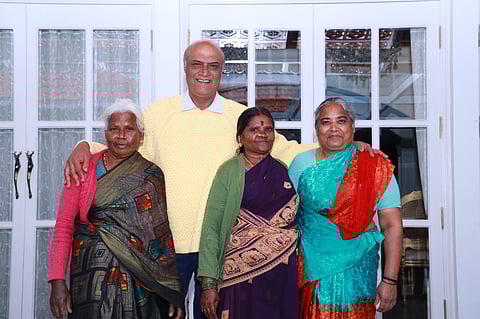 Jan Mohammed Sait with the staff