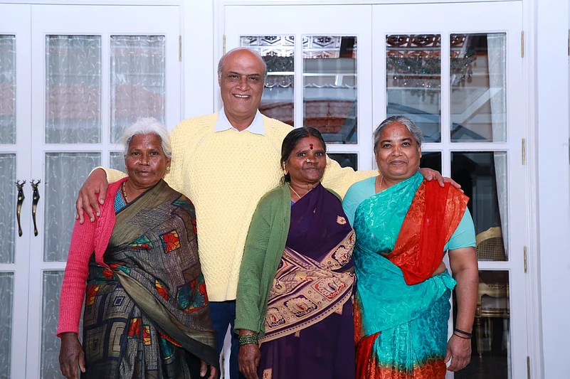 Jan Mohammed Sait with the staff