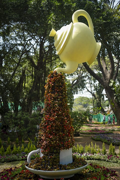 The flower show showcases beautiful floral designs and sculptures