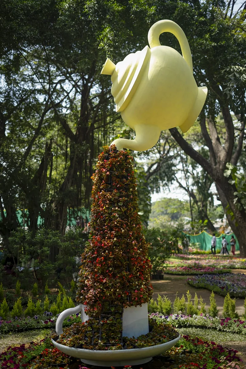 The flower show showcases beautiful floral designs and sculptures