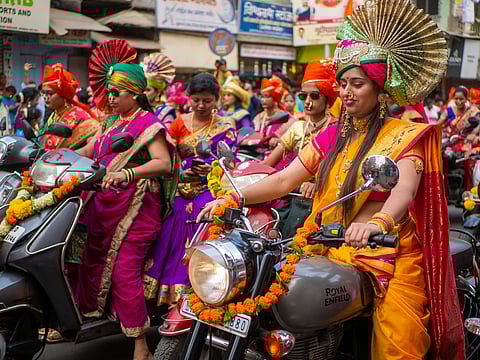 Women dressed in traditional attire during a procession celebrating Gudi Padwa in Mumbai