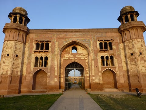 The interior surface of the gateways was covered with brilliantly coloured tile work of the mosaic variety at Dakhni Sarai