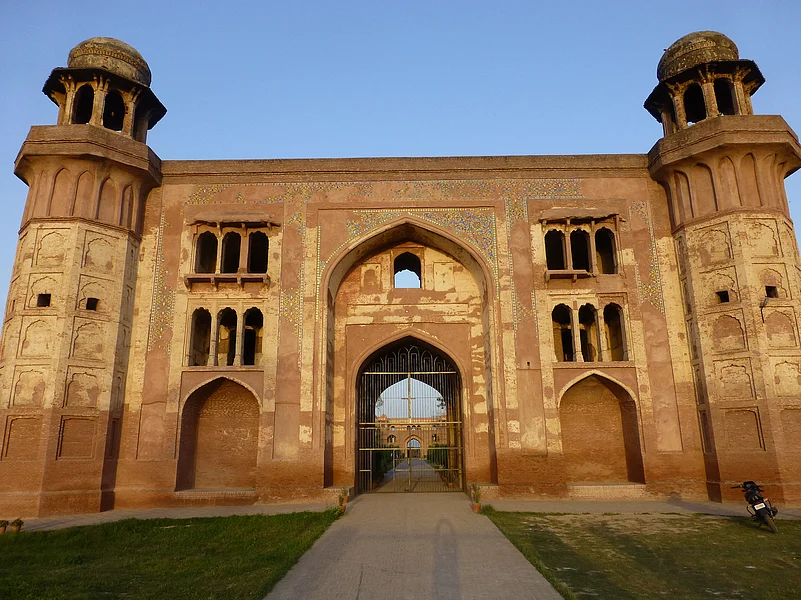 The interior surface of the gateways was covered with brilliantly coloured tile work of the mosaic variety at Dakhni Sarai