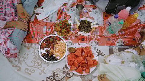 Devotees waiting to break their fast