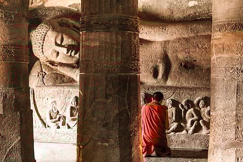Ancient statue of reclining Buddha at Ajanta Caves, Aurangabad