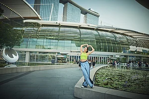 Ananya embraces love against the captivating backdrop of Marina Bay Sands, where architecture and grandeur converge in Singapore’s iconic skyline.