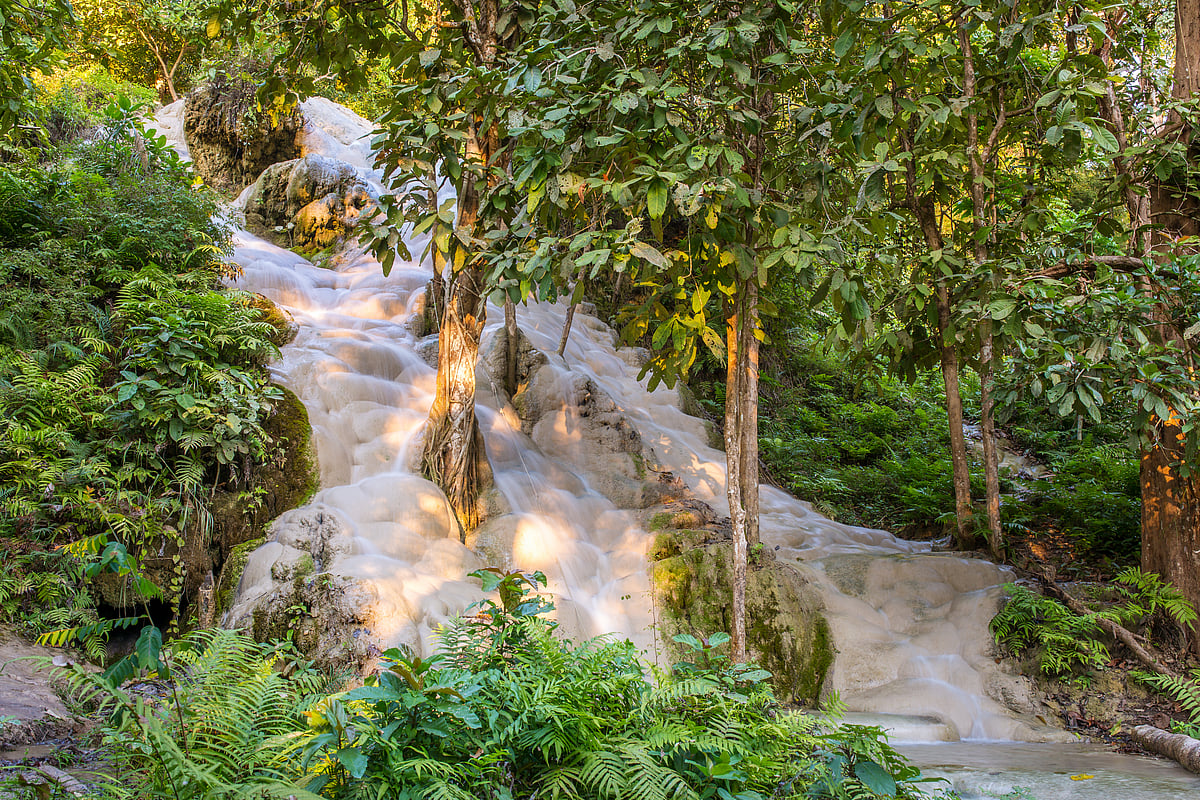 The Namtok Buo Tong Waterfall in Chiang Mai have a limestone surface which you can walk over