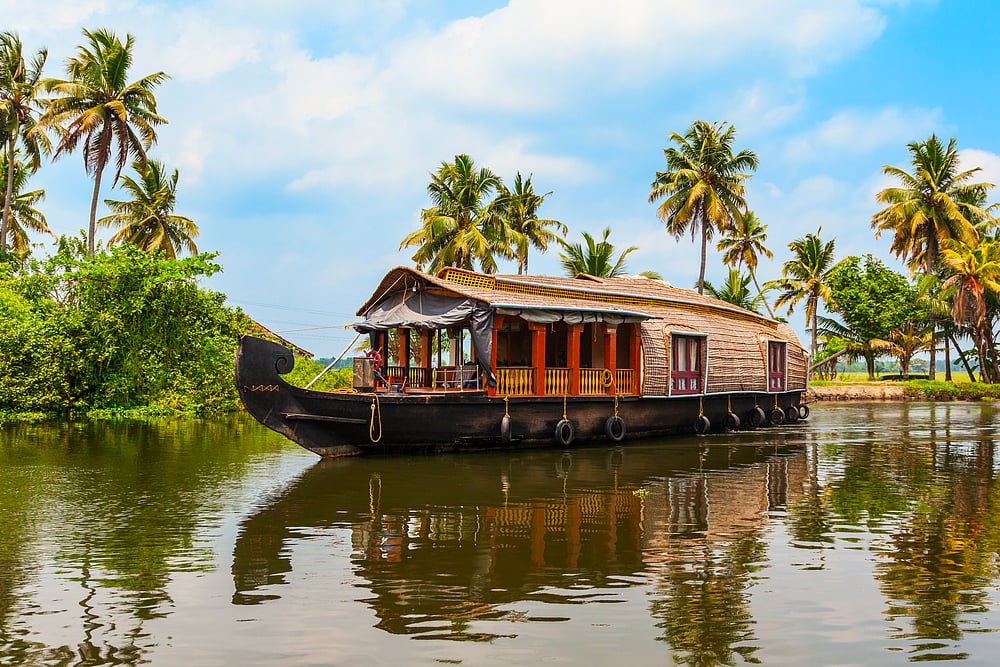 A houseboat sailing in Alappuzha backwaters