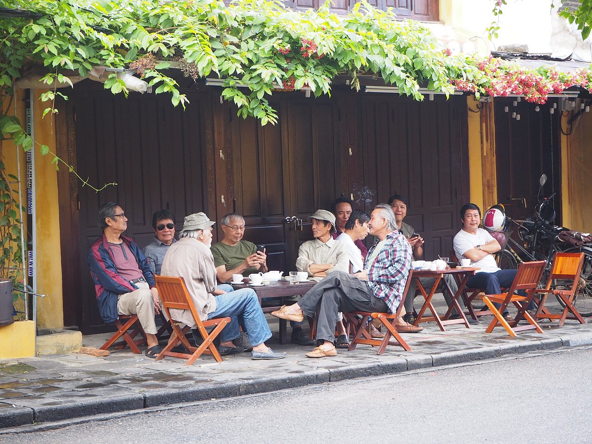 A group of men have coffee in Hội An