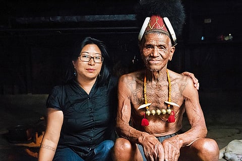 Phejin with an elder of the Konyak tribe