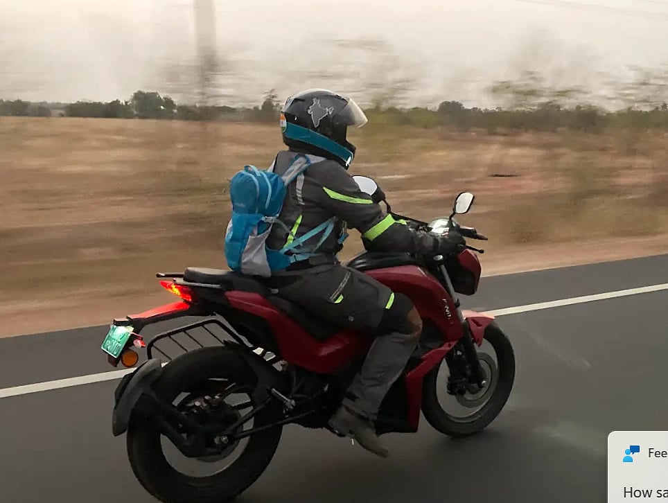 Jai Bharathi, founder of MOWO Social Initiatives leading the campaign on an electric bike