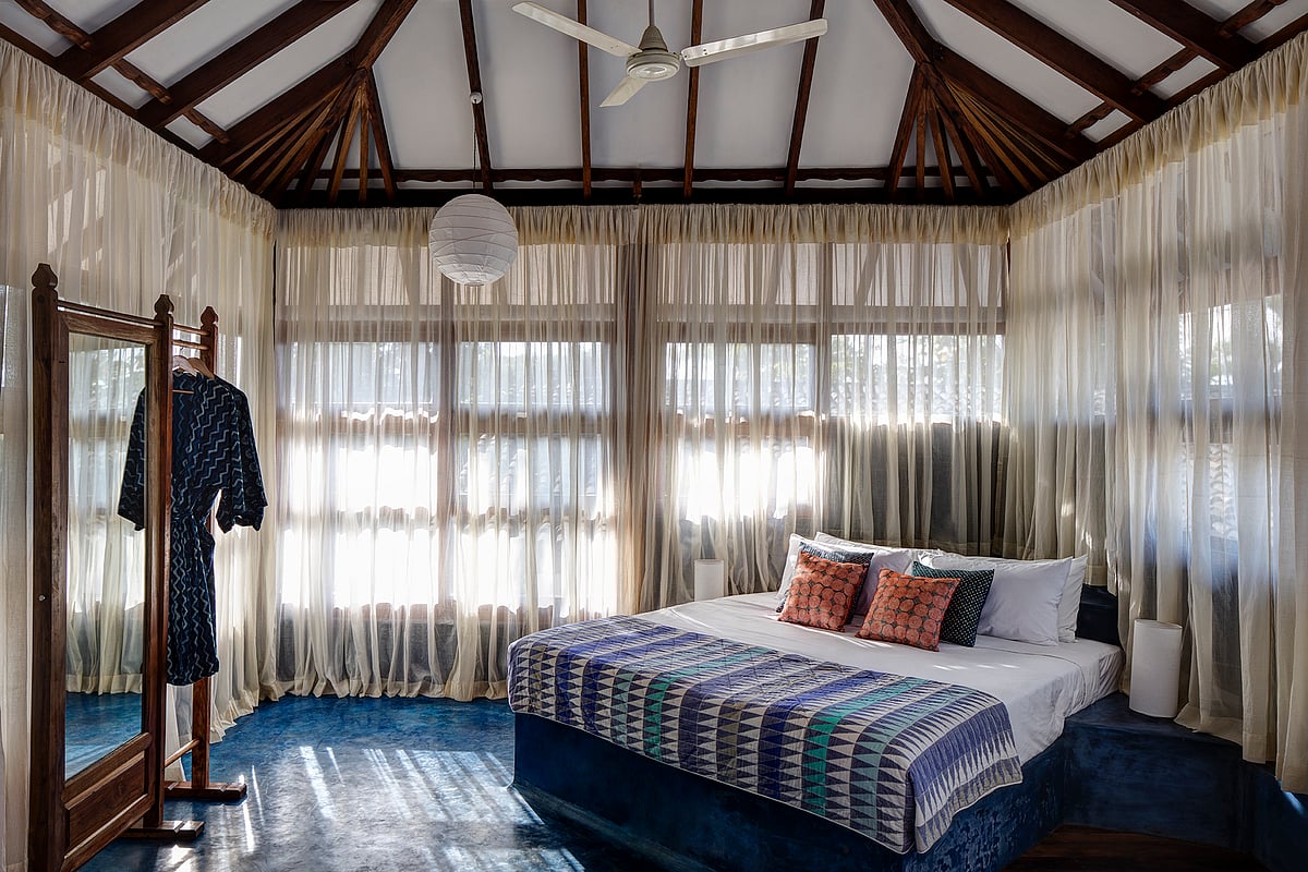 The interior curated by Weller is replete with earthy and cool-toned colours