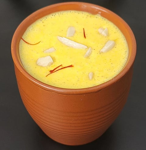 A glass of Piyush
