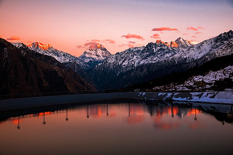 Nanda Devi (centre) lights up at sunset as seen from Auli
