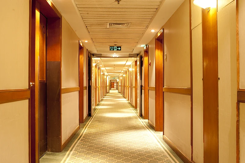Choose a room on an upper floor that is positioned in the middle of the hallway, away from lifts and other heavily trafficked areas.