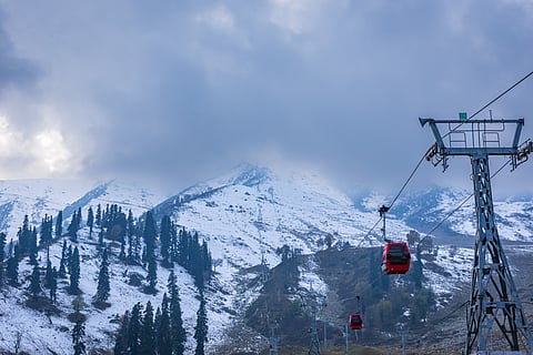 The twin peaks of Apharwat with the gondola lift in the foreground