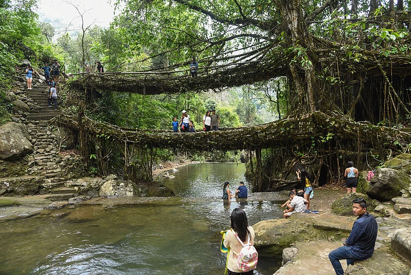 At the double decker living root bridge in Nongriat village