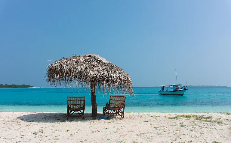 The administration is carefully monitoring the environmental impact of coastal tourism - Auggieferns on Shutterstock.com