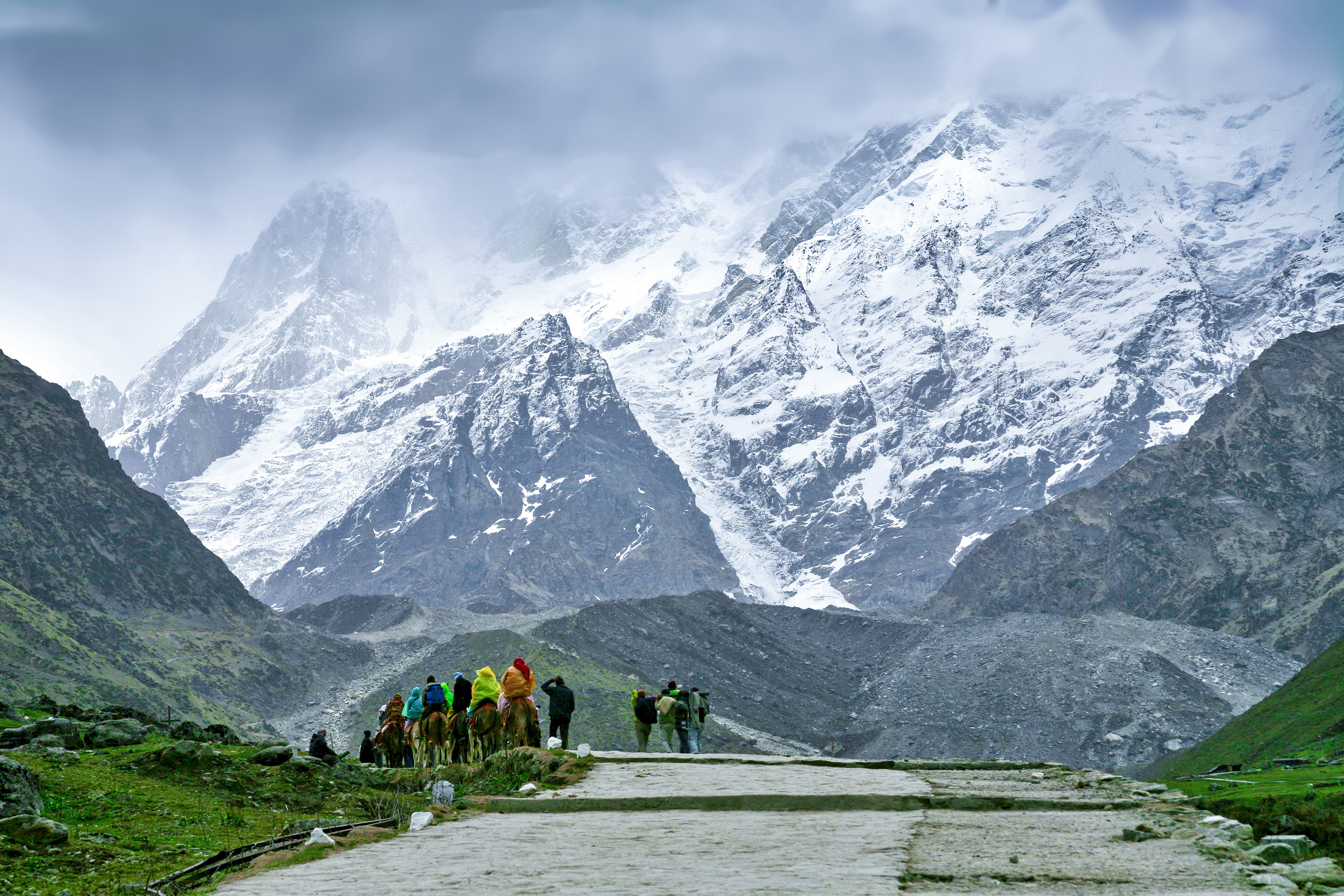 Pilgrims riding mules on the way to Kedarnath Temple