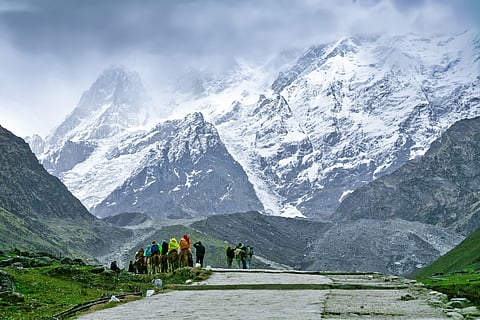 Pilgrims riding mules on the way to Kedarnath Temple