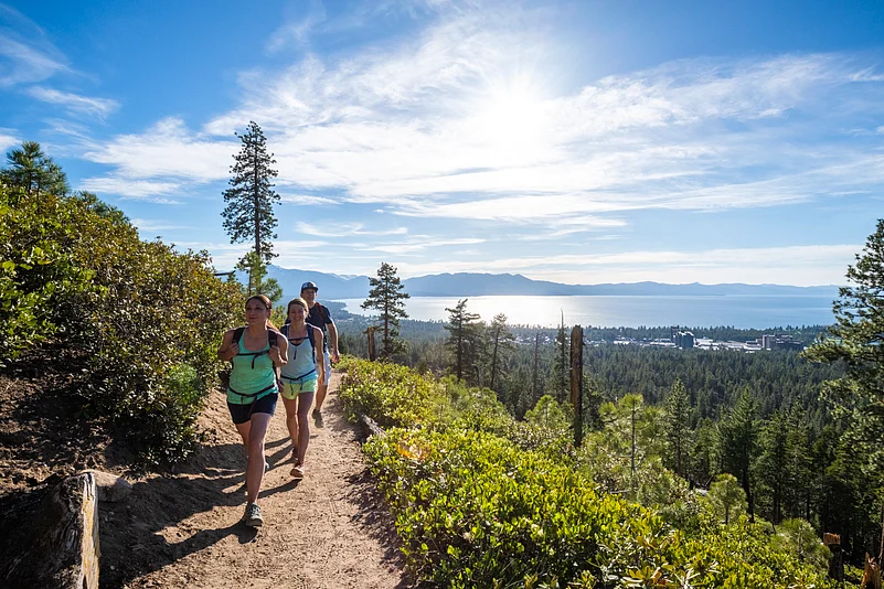 Travellers hiking near the lake