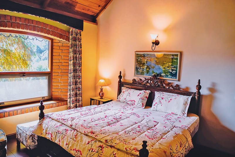 A cosy bedroom, one of four in the Villa
