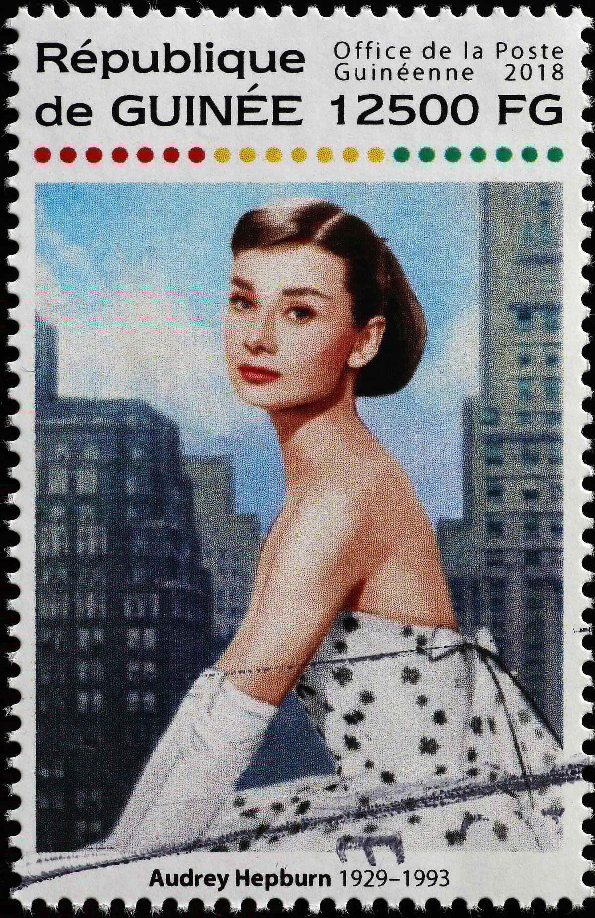 Shutterstock : Beautiful portrait of Audrey Hepburn on postage stamp