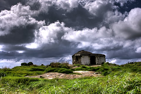 Storm clouds gather on Channagiri Hill
