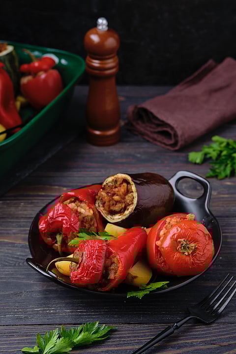 Gemista, stuffed with assorted baked vegetables in a vegetarian version