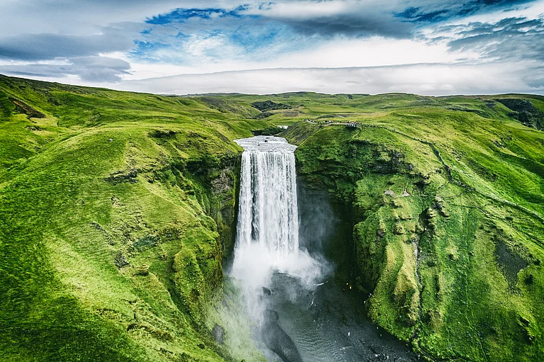 A beautiful view of Iceland waterfall Skogafoss - Shutterstock