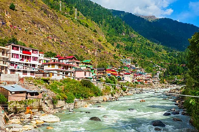 Shutterstock : Colourful local houses as seen in Kasol