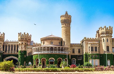 Shutterstock : The front facade of the Tudor-style Bangalore Palace