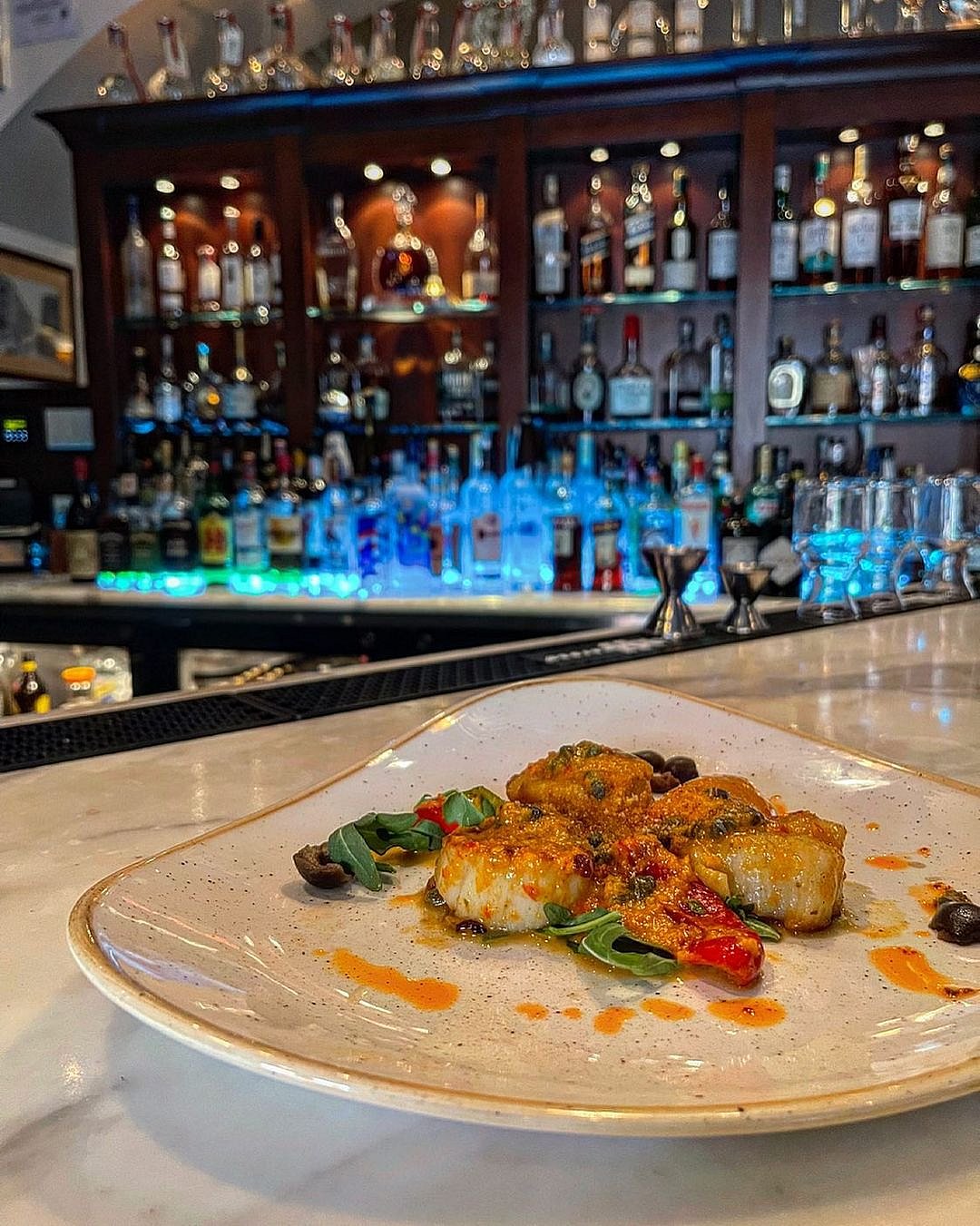 Indulge in Robertos sophisticated menu, complemented by an equally impressive wine selection