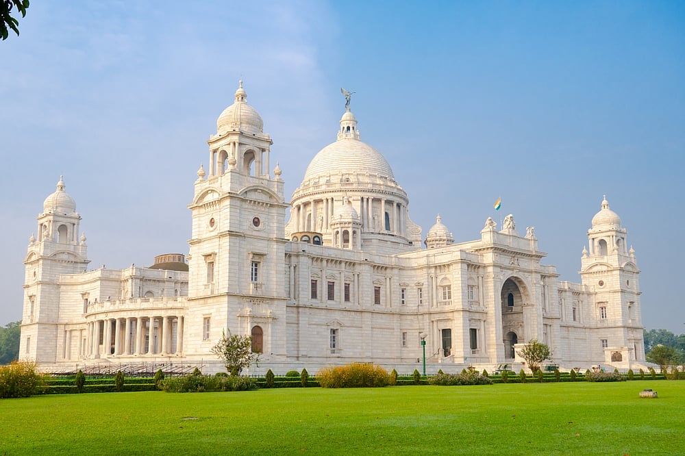The majestic white marble structure pays homage to Queen Victoria