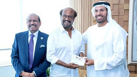 Rajnikanth (centre) receives his golden visa from the Abu Dhabi Department of Culture and Tourism 