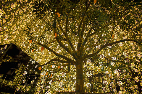 The "tree of Smritivan" is where people can add paper-made petals to the branches as messages