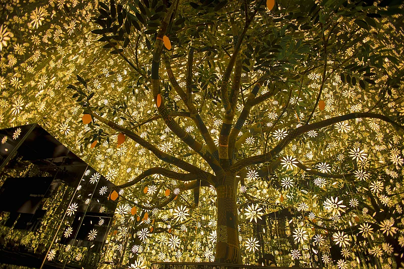 The tree of Smritivan is where people can add paper-made petals to the branches as messages