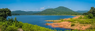 Shutterstock : The beautiful Burudih lake and the adjoining mountains in Ghatsila